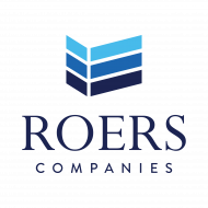 Logo for Roers Companies featuring a stylized blue building icon above the text.